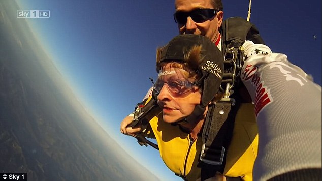 Nancy pictured skydiving on the first series of the show said she hopes her antics show others it is never too late to try something new