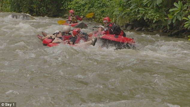 The group of grandmothers battle the white water of the Nile rapids in Uganda