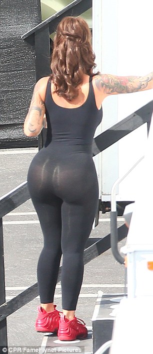 Figure hugging: The 32-year-old looked voluptuous in her skintight black outfit as she made her way to her trailer in Los Angeles