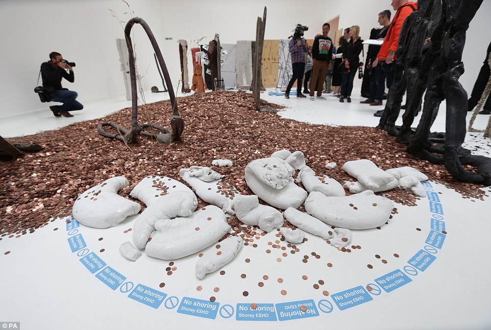 Fellow artist Michael Dean's work includes a sculpture consisting of £20,435.99 in pennies, representing 'one penny below the UK poverty line for a family of four